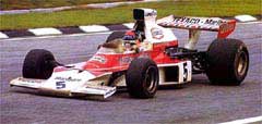 Brazil'1974 - Emerson Fittipaldi (McLaren M23/Ford Cosworth DFV 3.0 V8)